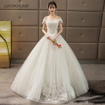 Gyönyörű csipke rátétes báli ruha Ujjatlan esküvői ruha menyasszonynőknek Illúzió Hátsó emelet hosszúságú menyasszonyi ruha